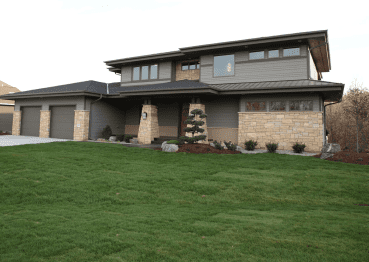 2 STORY PRAIRIE STYLE EXTERIOR WITH CONTEMPORARY INTERIOR